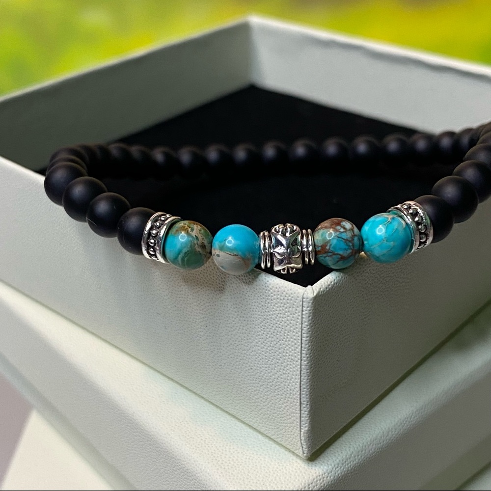 Hand made men’s bead bracelet matte black work a pop of color very minimal